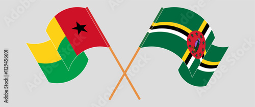 Crossed and waving flags of Guinea-Bissau and Dominica. Vector illustration