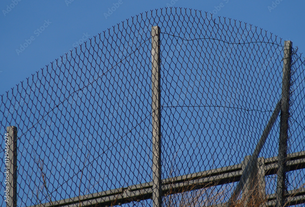 Metal fence close up, iron mesh for protection Metal fence close up, iron mesh for protection