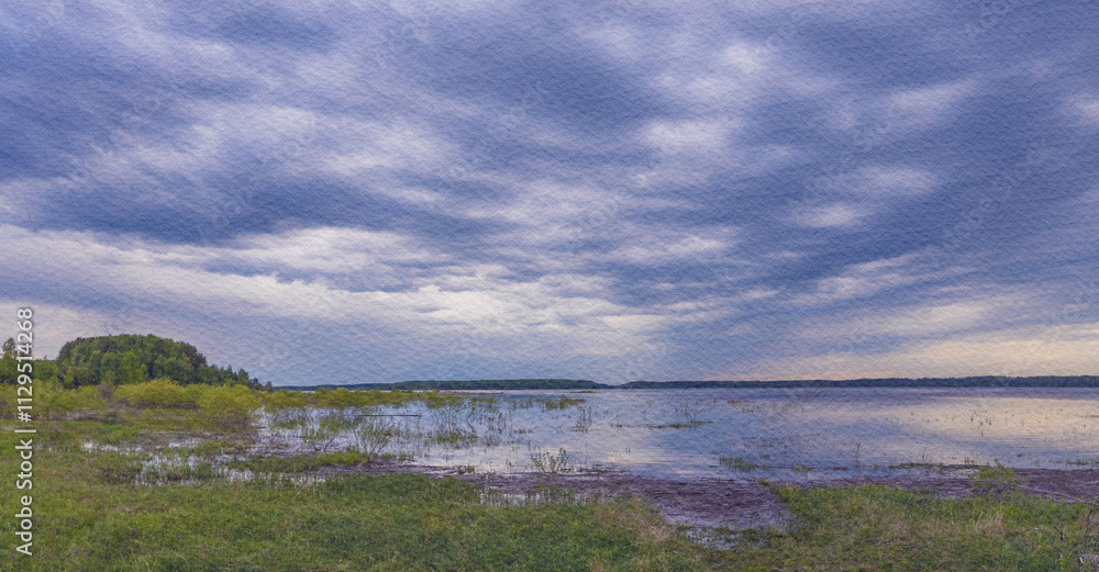 Cloudy sky over a lake with a few trees in the background Cloudy sky over a lake with a few trees in the background