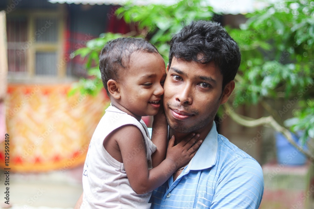 South asian young child having fun time with his father in outdoor, family togetherness conceptual photo South asian young child having fun time with his father in outdoor, family togetherness conceptual photo