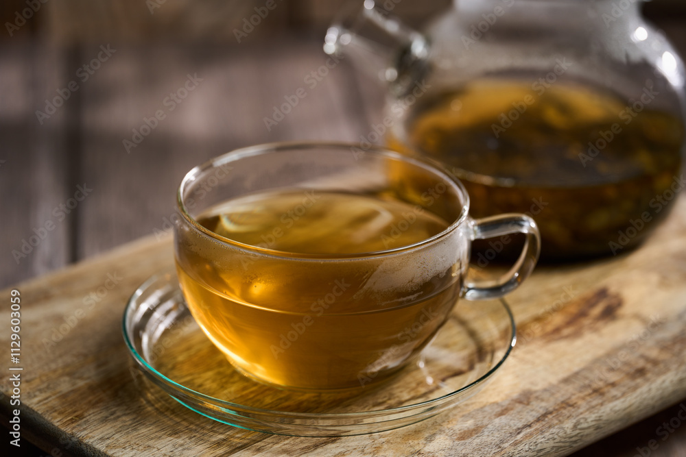 Hot Japanese Sencha tea in a glass cup Hot Japanese Sencha tea in a glass cup