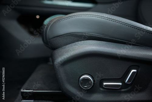 Explore the intricate functions of premium luxury car seat control buttons in detail photo