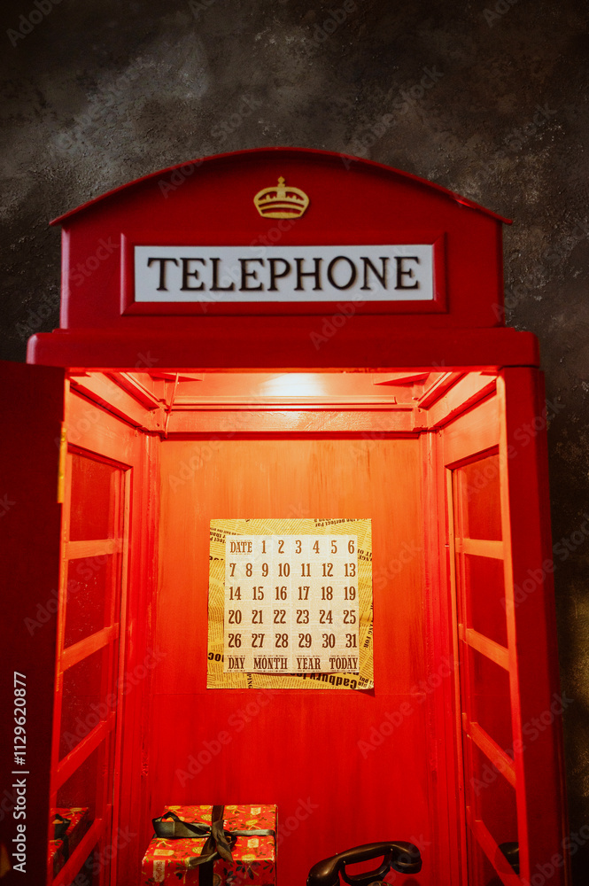 Fototapeta premium telephone booth, red in the interior