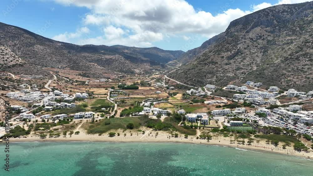 Aerial drone cinematic video of famous port and small picturesque seaside village of Kamares, Sifnos island, Cyclades, Greece Aerial drone cinematic video of famous port and small picturesque seaside village of Kamares, Sifnos island, Cyclades, Greece