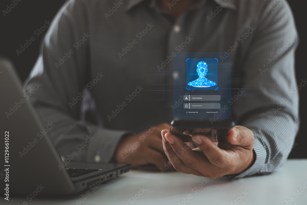 © THAWEERAT - Biometric Security System. Authentication by facial recognition concept. Digital connections, data protection. Businessman scan their face with a mobile smartphone to unlock and access personal data. © THAWEERAT - Biometric Security System. Authentication by facial recognition concept. Digital connections, data protection. Businessman scan their face with a mobile smartphone to unlock and access personal data.