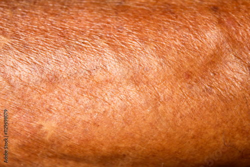 Brown skin texture of old Asian men's feet