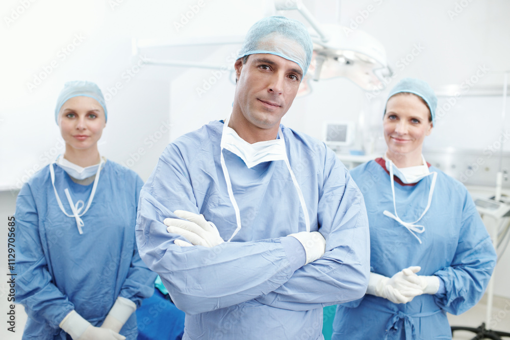 Obraz premium Doctors, team and confidence in portrait for theater, medical surgery or procedure with pride. Hospital, surgeons and man leader with arms crossed for operating room, clinic or ppe uniform for safety