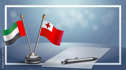 United Arab Emirate and Tonga National flags on small table with bokeh background, cooperative relationship