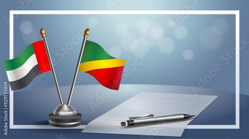 United Arab Emirate and Republic of North Congo National flags on small table with bokeh background, cooperative relationship