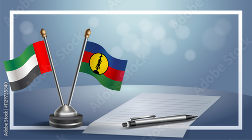 United Arab Emirate and New Caledonia National flags on small table with bokeh background, cooperative relationship