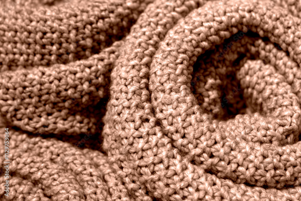 Woolen knitted fabric close-up in trending color of the year 2025. Woolen knitted fabric close-up in trending color of the year 2025.