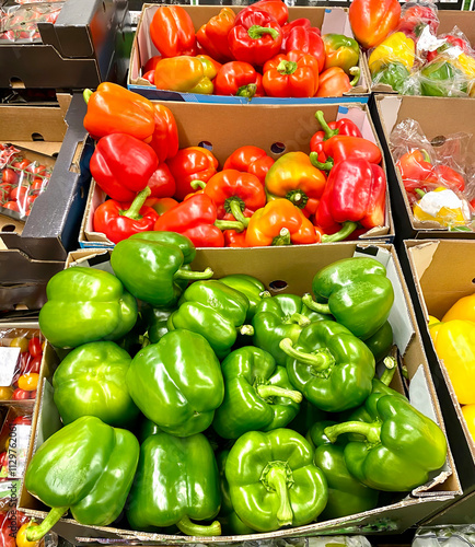 Red and Green peppers for sale at a garden market