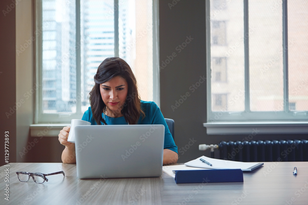 Coffee, business woman and laptop in office for asset management, review client profit data and revenue. Financial advisor, employee and reading report for retirement planning and investment strategy Coffee, business woman and laptop in office for asset management, review client profit data and revenue. Financial advisor, employee and reading report for retirement planning and investment strategy