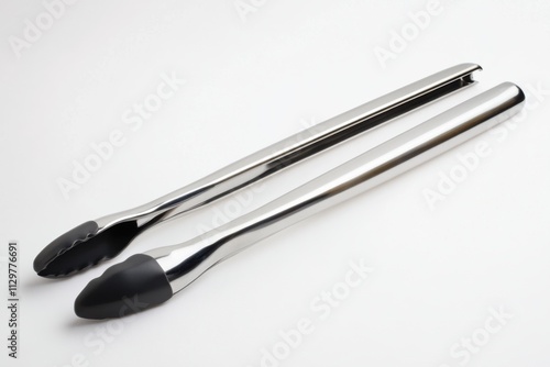 A Pair of Sleek Stainless Steel Kitchen Tongs with Black Silicone Tips Ideal for Grilling and Serving Food