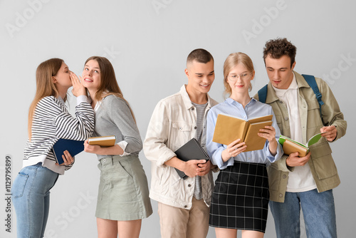 Group of students with book...