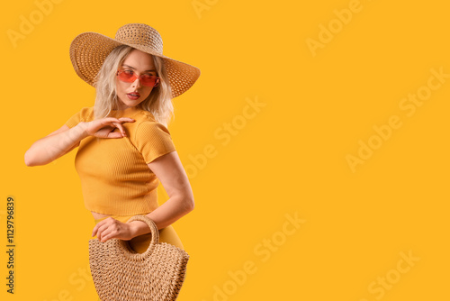 Young woman in stylish sung...