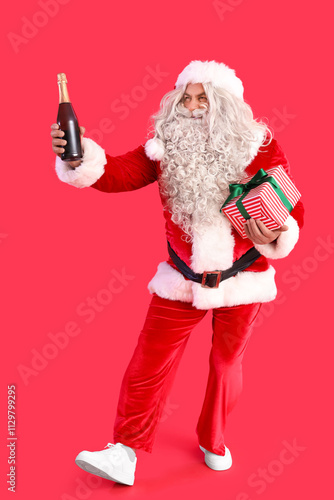 Santa Claus with bottle of ...