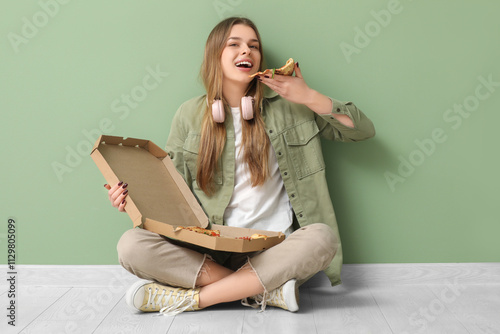 Teenage girl eating delicio...