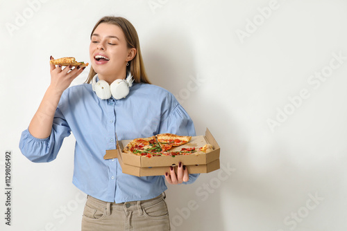 Teenage girl eating delicio...
