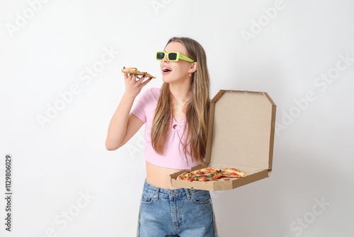 Teenage girl eating delicio...