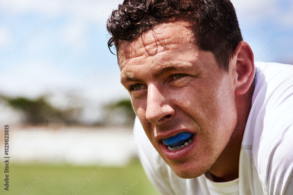 Fototapeta premium Man, rugby and burnout on match at field with sweat for sports game, tournament and competition in New Zealand. Male person, stadium and exhausted as player or athlete on half time with workout