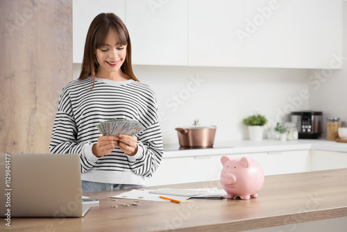 Young woman with dollar ban...
