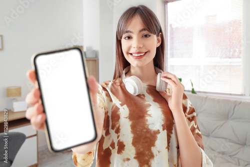 Young woman with blank mobi...