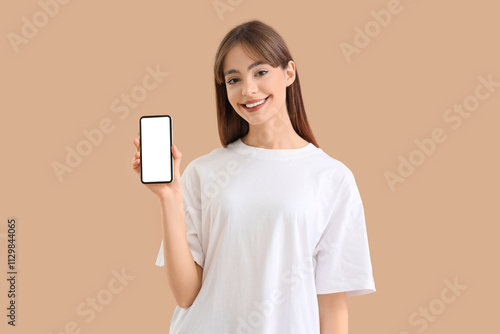 Young woman with blank mobi...