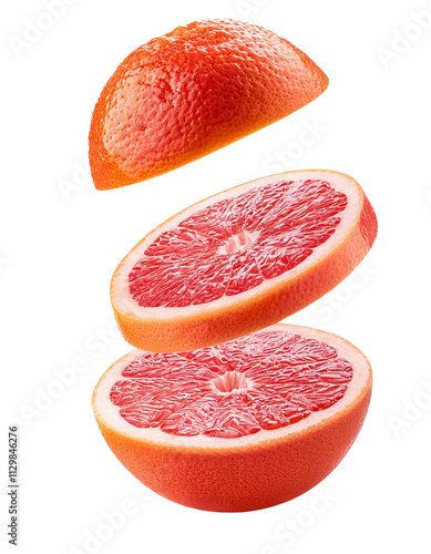 A vibrant juicy slice of falling grapefruit isolated on white segments glistening in full depth of field