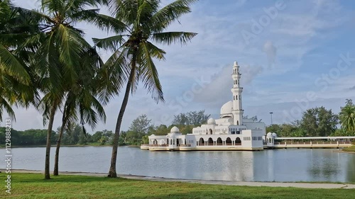 Static shot - Exterior view of Terengganu famous floating mosque (Masjid Tengku Zaharah) in Kuala Terengganu, Malaysia. photo