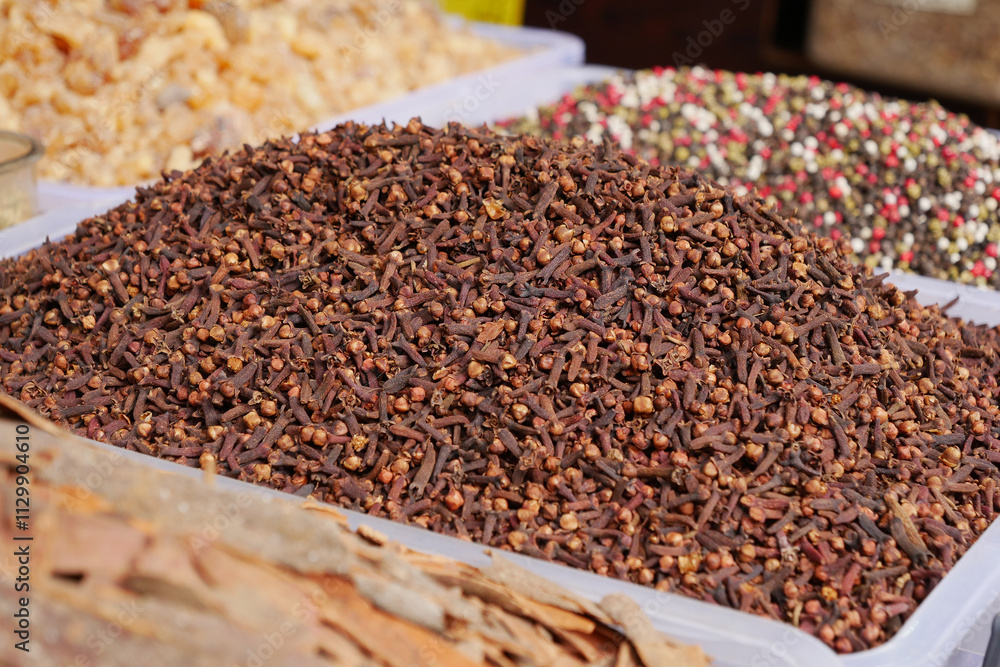 Fragrant and Dried Cloves on Display in a Lively Spice Market Fragrant and Dried Cloves on Display in a Lively Spice Market