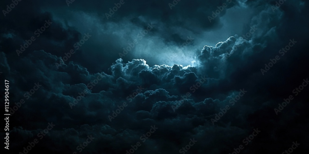 Fototapeta premium Dramatic Dark Clouds with High Contrast Lighting in a Cinematic Atmosphere Capturing an Intense and Mysterious Sky View at Night