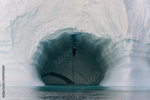 Ice Cave in an Iceberg on Water