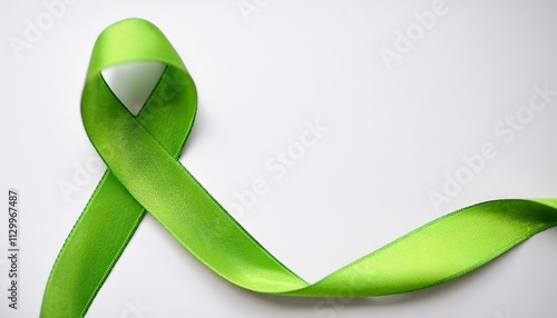 Lymphoma Awareness Symbol. Lime Green Ribbon with Copy Space for Text. White Background Isolated. Flat Lay Top View.