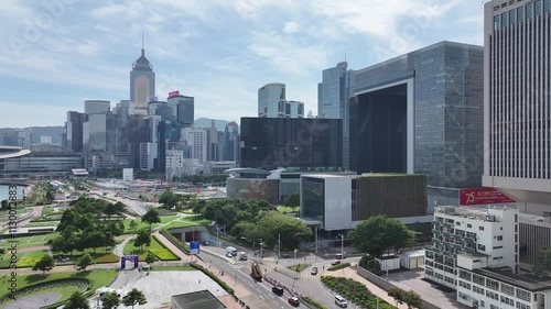 Skyview of Hong Kong Central Harbourfront surrounded by skyscrapers in the financial district. Overlooking Victoria Harbour Admiralty Wan Chai Tsim Sha Tsui West Kowloon photo