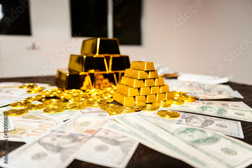 Gold bars and stacks of cash sit on a table at night, symbolizing wealth, investment, and financial success. They represent rich investment plans in gold trading, mining, and the stock market photo