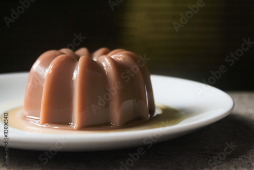 A plate of chocolate jelly pudding as dessert