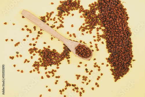 Red annatto seeds powder - Bixa orellana photo