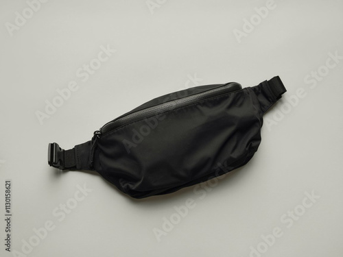 Black blank Fanny pack mockup.Eco friendly stylish trendy Waist pack Zippered Fanny Pack laying flat photo