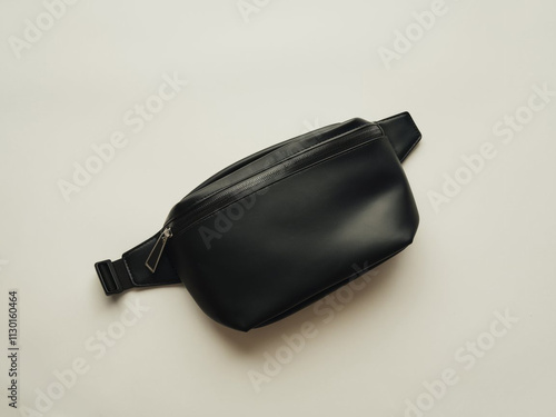 Black blank Fanny pack mockup.Eco friendly stylish trendy Waist pack Zippered Fanny Pack laying flat photo