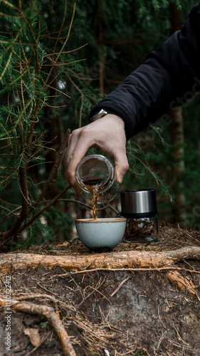 Wallpaper Mural Pouring a Hot Beverage in Nature A Unique Coffee Experience Amidst the Great Outdoors Torontodigital.ca