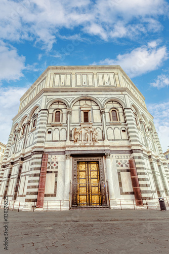 The medieval baptistery is located in the Cathedral Square in front of the Florence Cathedral of Santa Maria del Fiore. It is one of the oldest buildings in the city. Florence, Tuscany, Italy.