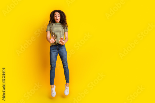 Photography Full size photo of astonished speechless girl dressed striped t-shirt jeans flyi