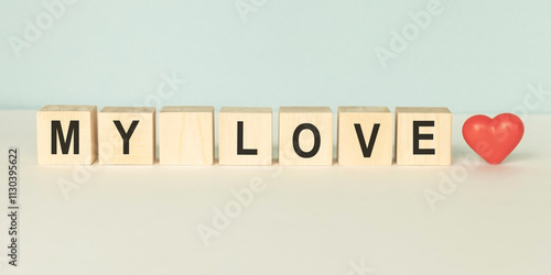 Sharp pencil, card and evelope with LOVE cube word . Concept for love story or letteror message, togetherness of friendship or family or couple or lover, wedding inviation. Be my Valentine. photo