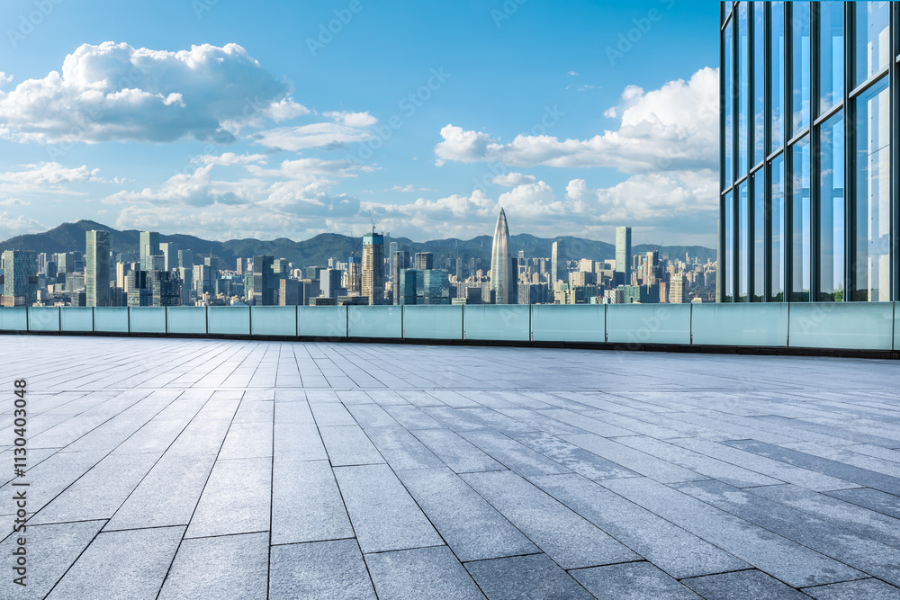 Empty square floor with modern city buildings scenery in Shenzhen, China. Outdoor city background Empty square floor with modern city buildings scenery in Shenzhen, China. Outdoor city background