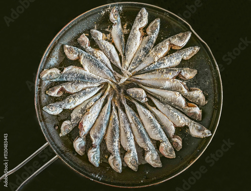 Obraz na płótnie Horse mackerel fish mixed with white flour to be cooked. w salonie