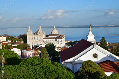 Alfama, Lisbon, Portugal (Europe). It s a famous tourist place. Tourist comes from the allover world to see the old churches of the city and especially the trams moving in the street of Old Alfama cit photo