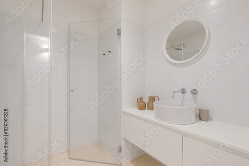Minimalist bathroom featuring sleek shower.