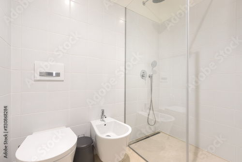Minimalist bathroom featuring sleek shower.