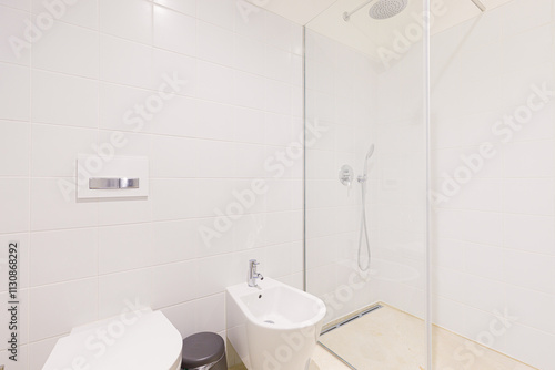 Minimalist bathroom featuring sleek shower.